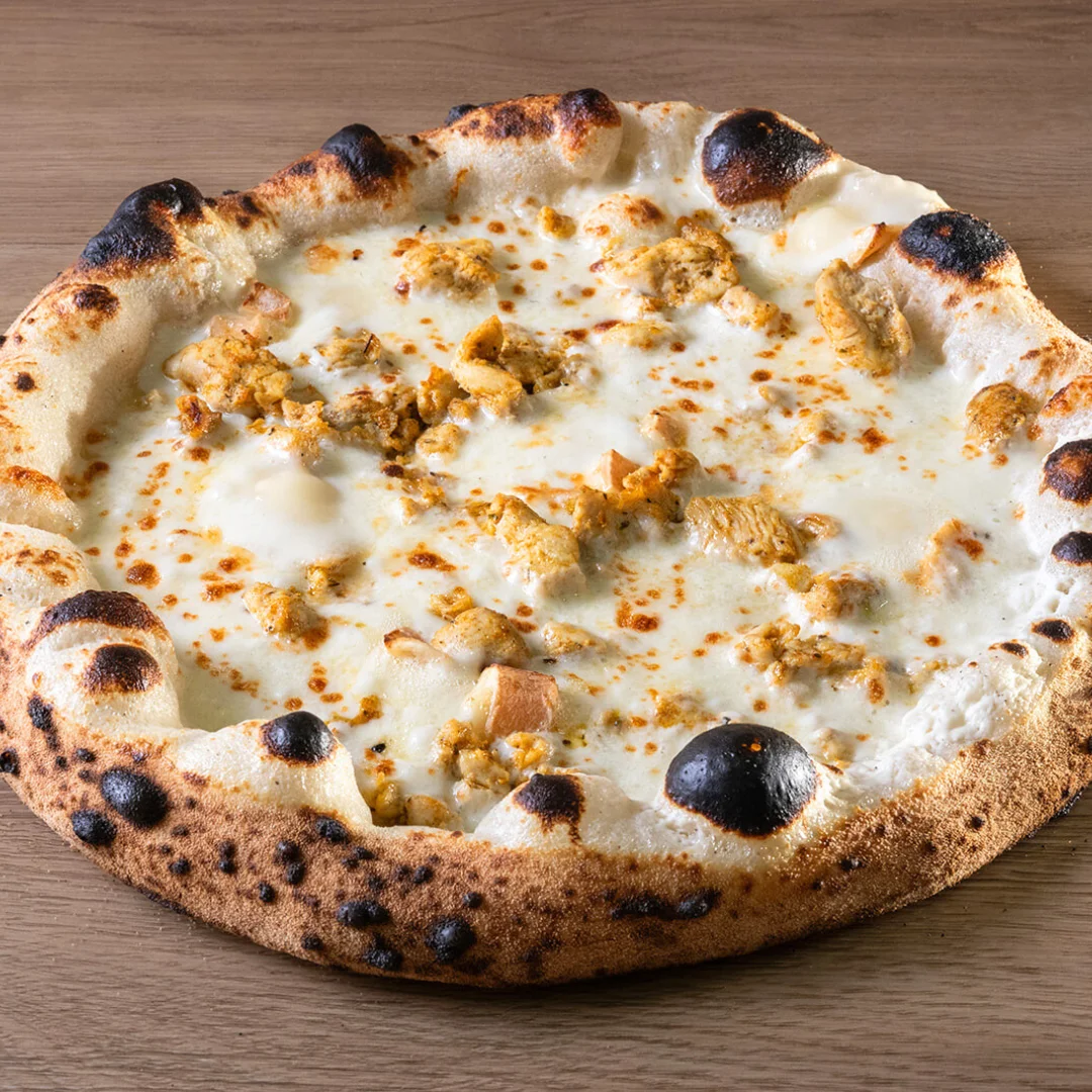 Pizzas cuites au feu de bois - L'artigiano